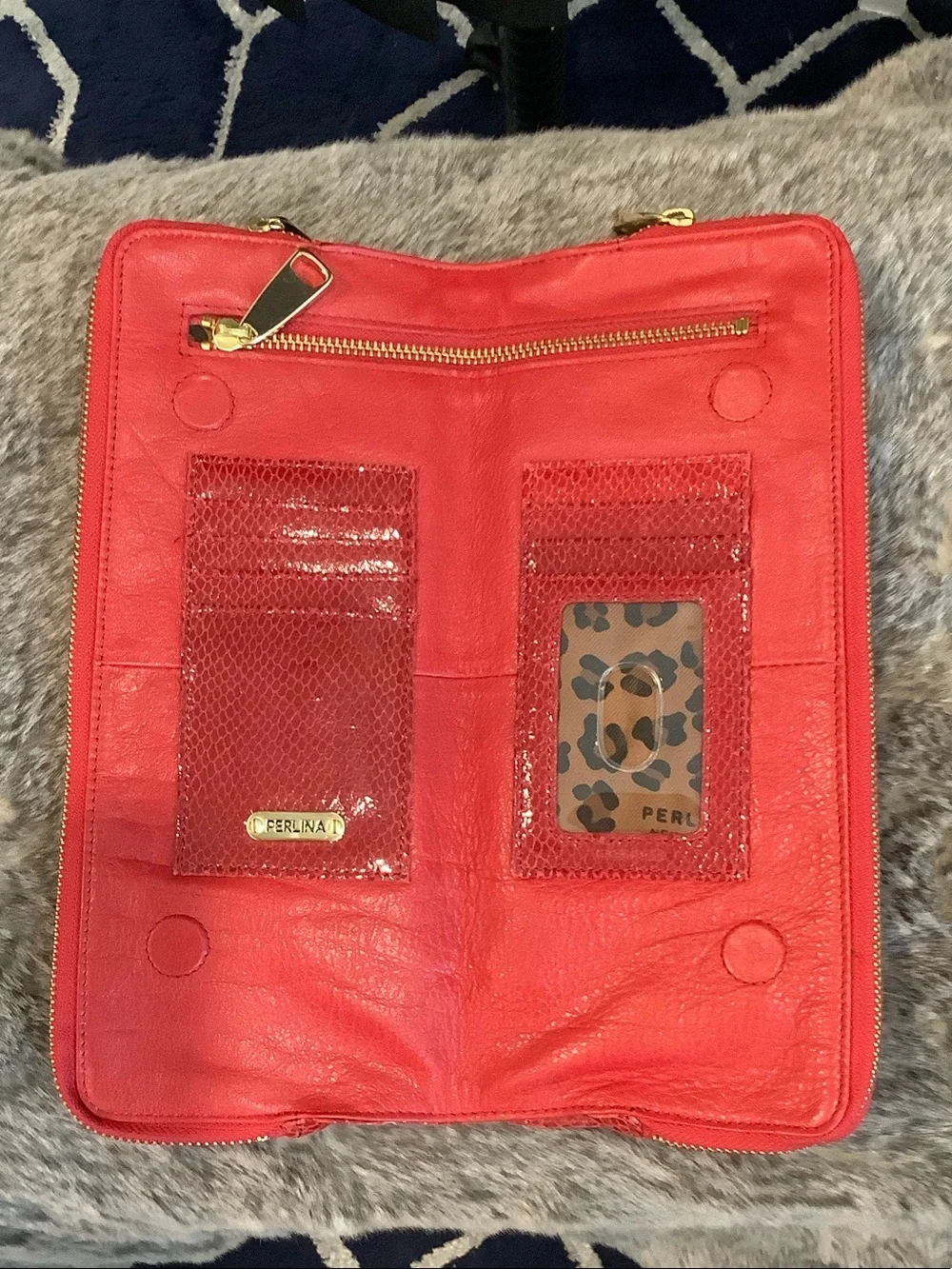 Perlina Red Zip-Around clutch bag with Gold trim